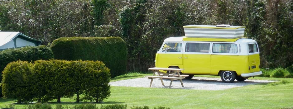 yellow vw campervan on all-weather pitch 20