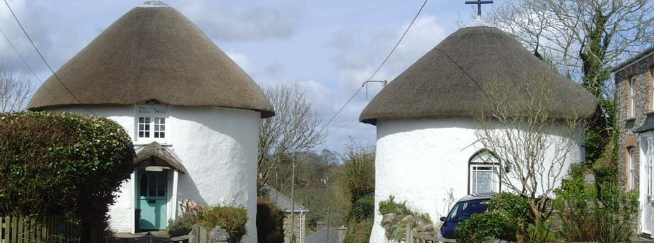 the two round houses that mark the entrance to Veryan