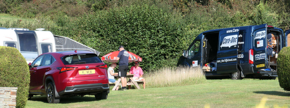 mobile caravan engineer van calling on site for repairs and service